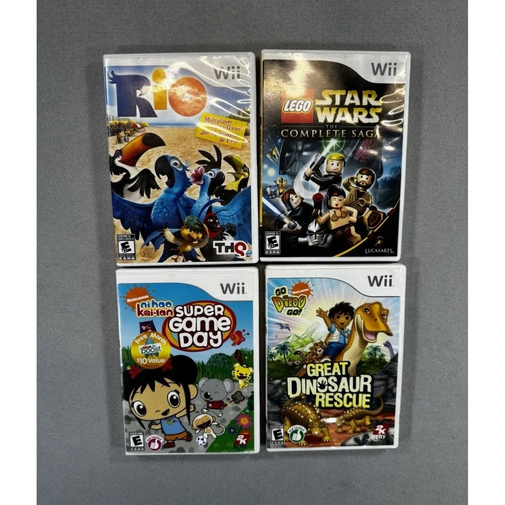 Nintendo Wii Lot of 4 Games w/ Manuals: Rio, LEGO Star Wars Complete Saga
